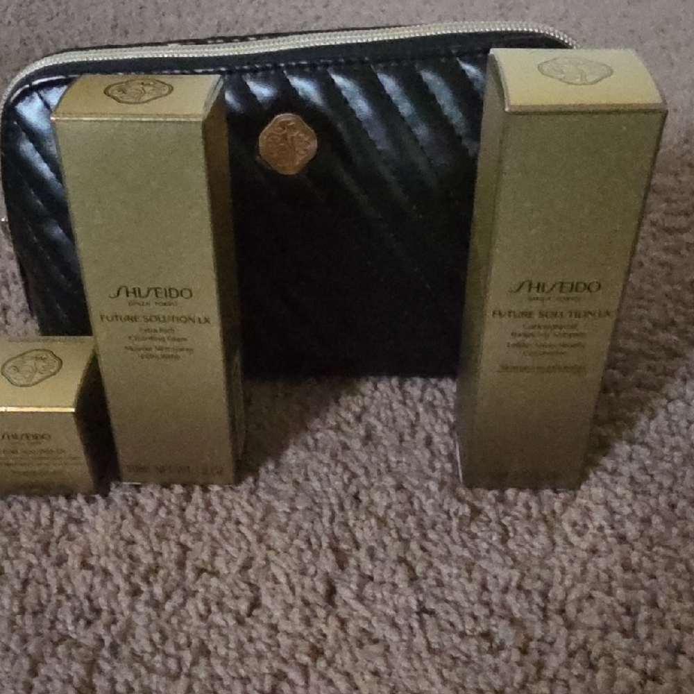 Shiseido Future Solution LX with Gold and Black Pouch